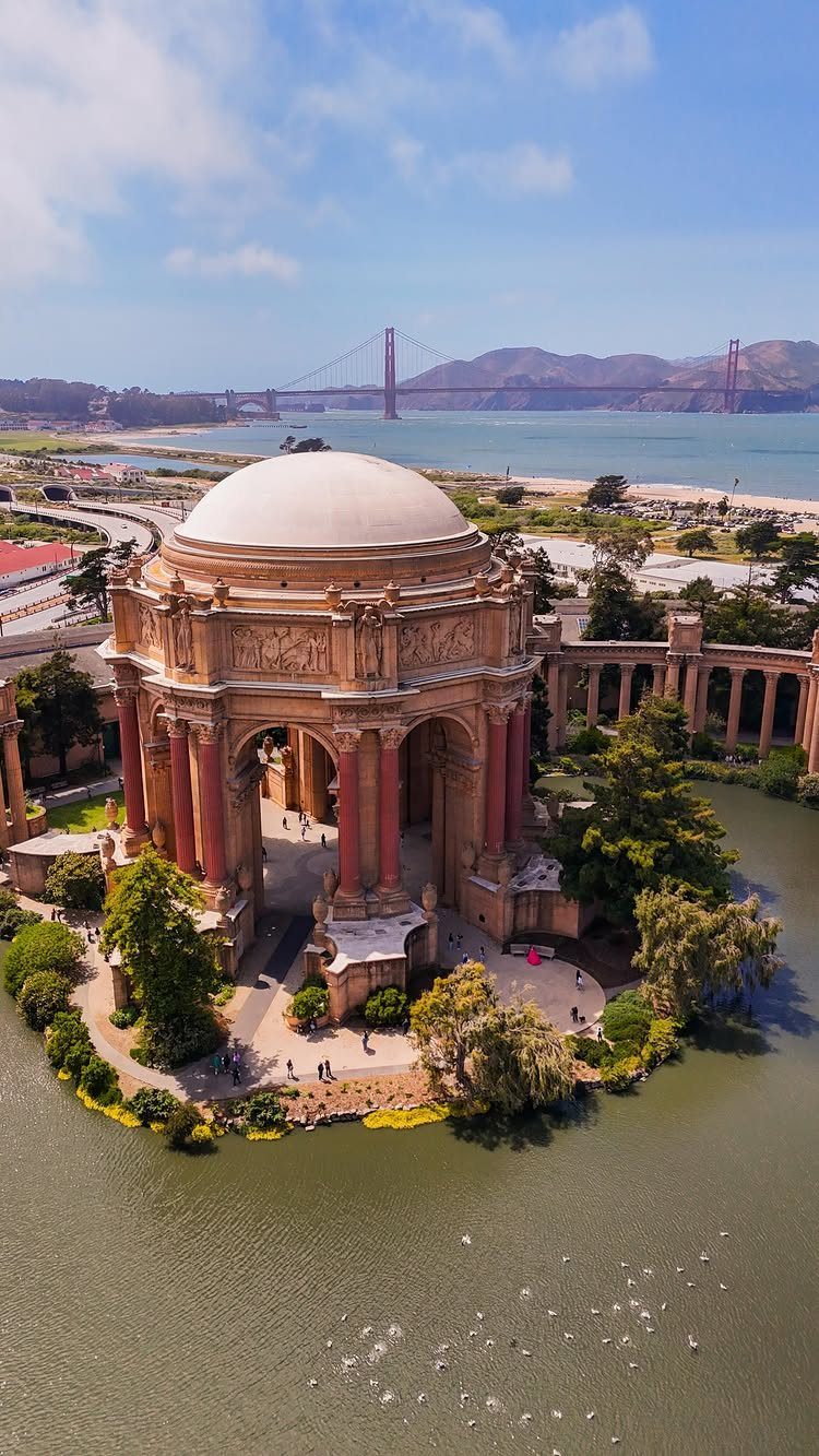 Bucket List Travel Destinations in the USA: 33 Ideas 4 Palace of Fine Arts rotunda and lagoon with Golden Gate Bridge in background