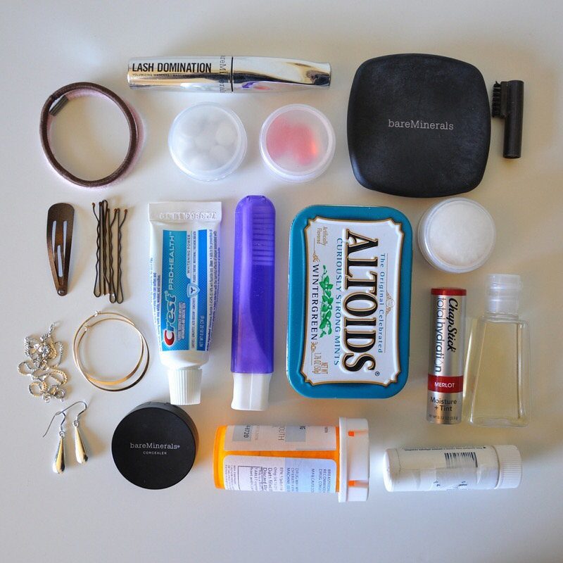 How to Pack for a 3 Week Trip: 7 Packing Ideas 1 Travel-sized toiletries and personal care items arranged on a plain white background.