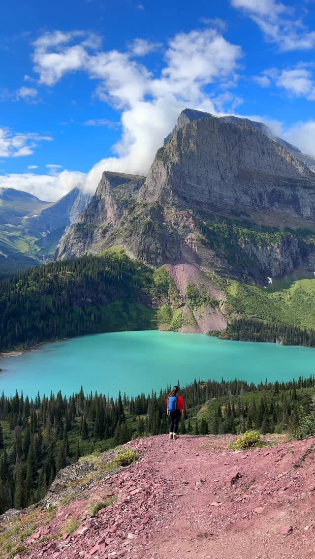 Nature Places to Visit: 19 Parks, Gardens and Overlooks 9 Person standing on a red cliff overlooking a turquoise lake and mountains