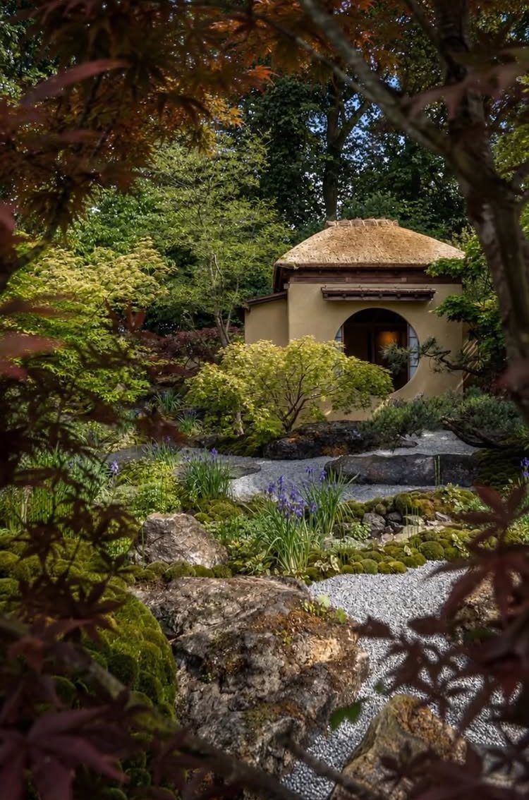 Nature Places to Visit: 19 Parks, Gardens and Overlooks 1 Japanese garden with a thatched roof cottage, gravel paths, and red maple leaves.