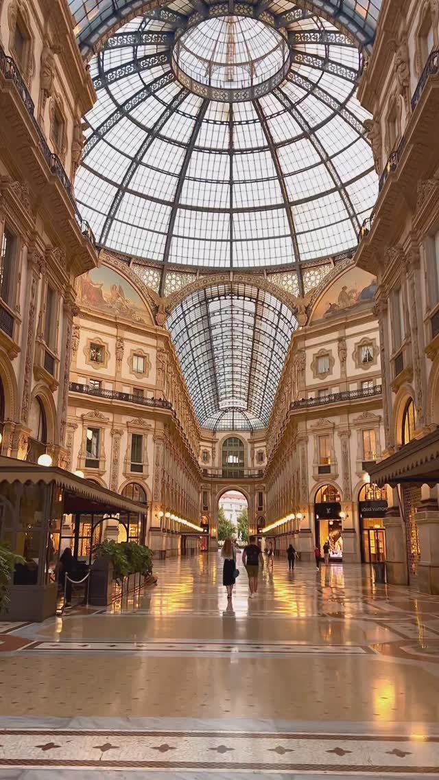 Galleria Vittorio Emanuele II with its grand glass vaulted ceiling and marble floors.