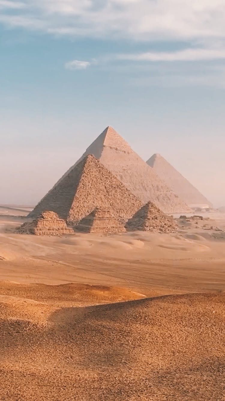Prettiest Place to Visit: 21 Ideas Around the World 10 Ancient stone pyramids rising from the golden sands of the Egyptian desert.
