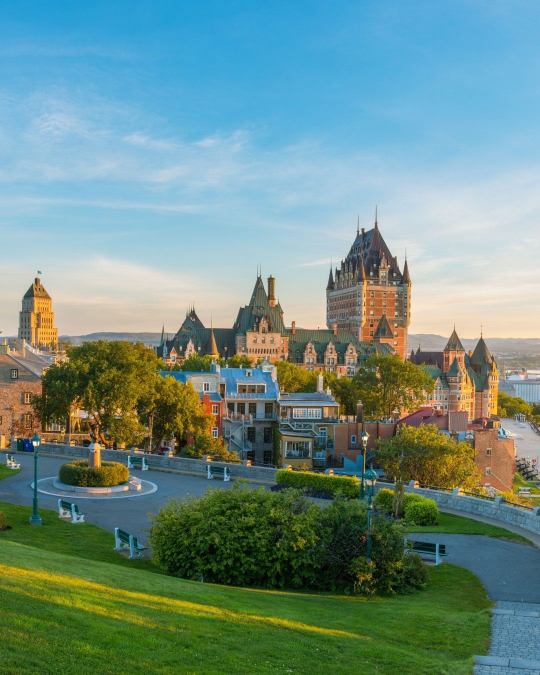 Quebec City skyline featuring the historic Château Frontenac hotel and European architecture.