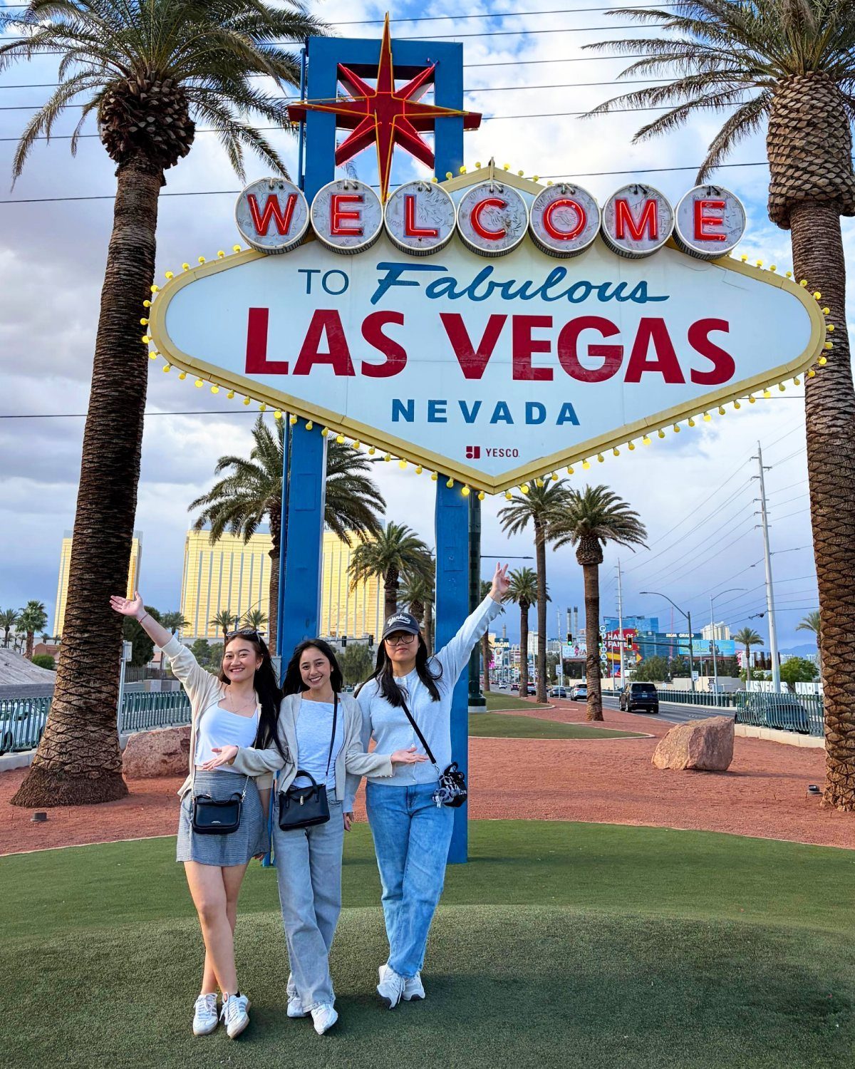 12 Vacation Ideas with Friends, from Cruises to Cancun 7 Three women posing in front of the Welcome to Fabulous Las Vegas sign.